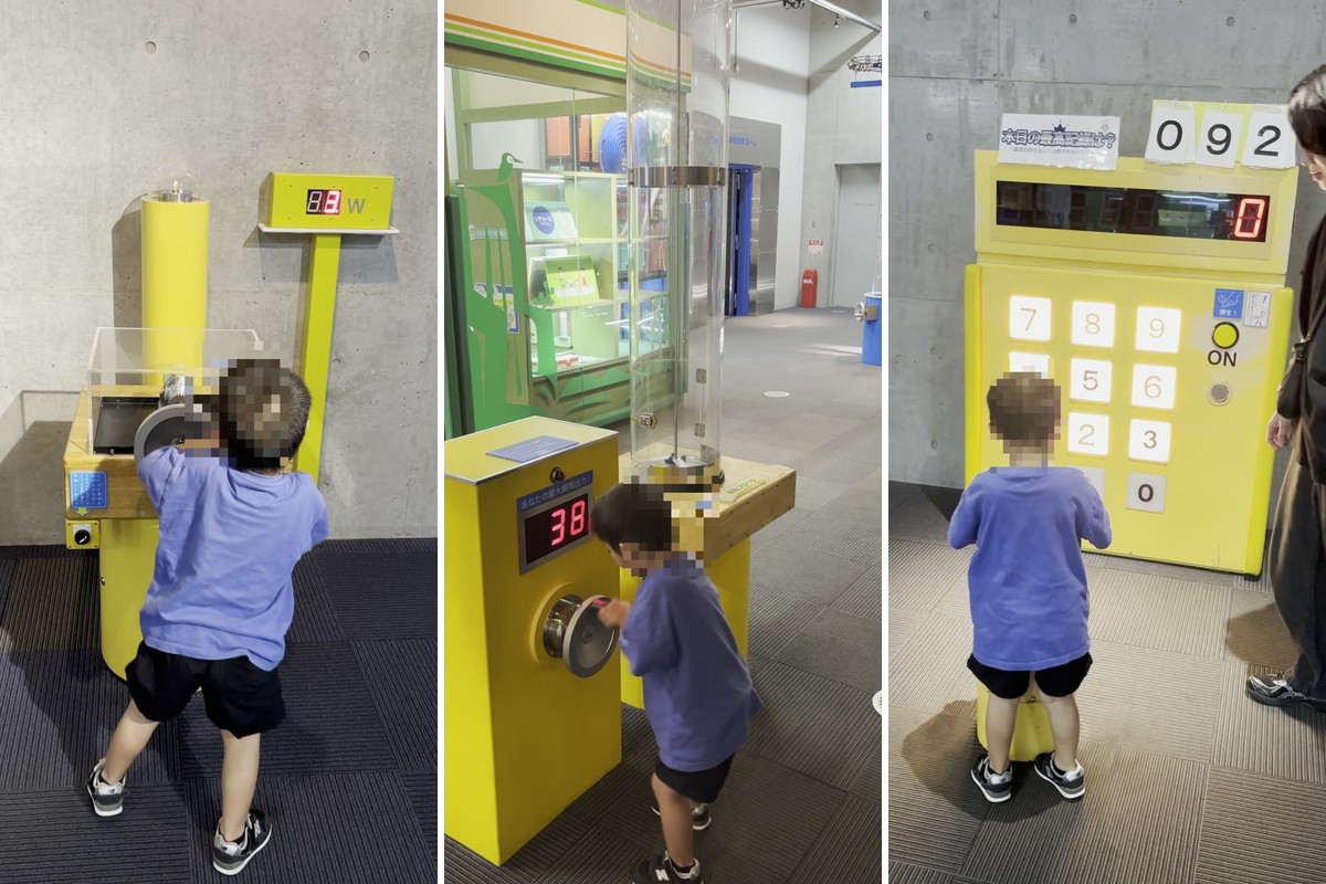 発電体験の展示3種でハンドルやダイヤルを回す子ども